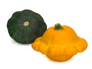 Two types of Patty pan Squash on a white background