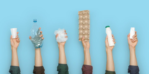 Concept of garbage sorting and ecology. Photo for website banner. Hands holding different trash