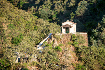 Chapel of Nossa Senhora da Piedade in Lousã, Portugal, on a sunny afternoon.