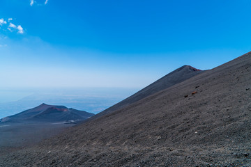 Fototapeta premium Volcanic mountains at Silvestri Craters in Etna National Park - Sicily, Italy
