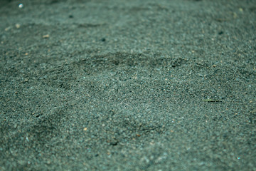 footprint on gray sand
