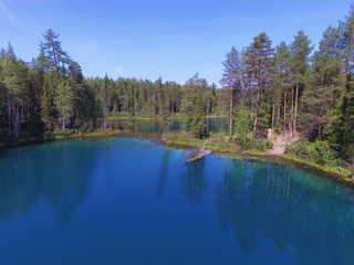Fototapeta premium Blue lakes in a coniferous forest. Parashikimi lake, Komi Republic, Russia.