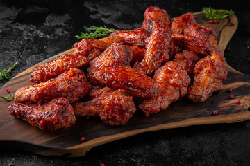 Delicious crispy chicken or turkey wings in a spicy sauce