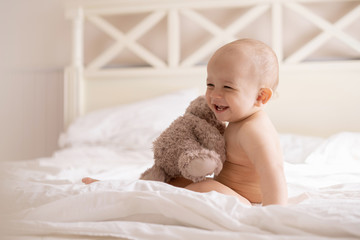 baby with teddy bear