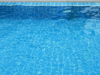 Obraz premium blue swimming pool with water wave