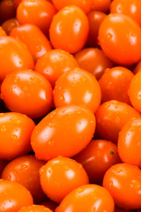 Close-up of fresh cherry tomatoes as a background