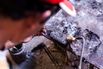 31 May 2010, Yogyakarta, Indonesia: People Work At Gold Handicraft Workshop