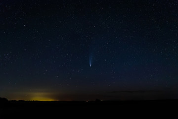 Obraz na płótnie Canvas comet neowise in the starry night sky.