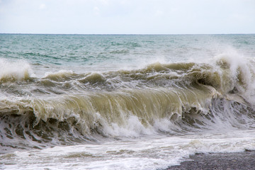 Stormy weather, waves and splashes in Batumi, Georgia. Stormy Black sea.