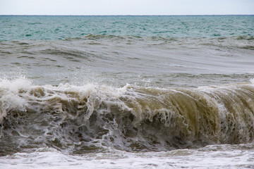 Stormy weather, waves and splashes in Batumi, Georgia. Stormy Black sea.
