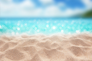 Fototapeta na wymiar Summer paradise sandy beach with blur palms and bokeh light in the sea Summer concept
