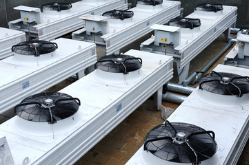 Pro air conditioning and ventilation systems set on the roof of building