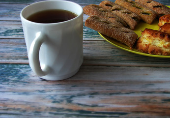 cup of coffee and cookies