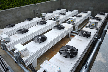 Pro air conditioning and ventilation systems set on the roof of building