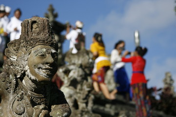 Thousands of locals come to the main temple to honor the gods