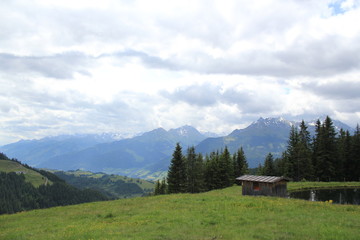 Fototapeta na wymiar mountain hut with view to a valley