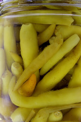 pickled peppers in a glass jar