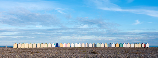 beach huts in cayeux s mer in french normandy under blue sky - obrazy, fototapety, plakaty