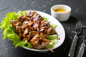 Chicken skewers with teriyaki sauce