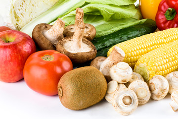 Variety of fresh vegetables on white background