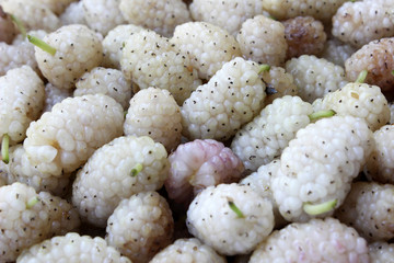 close-up organic and fresh white mulberries