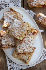 Streusel pie stuffed with rose jam, served with coffee. Rustic style.