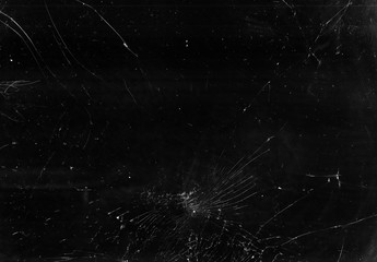 Broken glass overlay. Aged texture. Black cracked TV screen with white dust scratches effect.