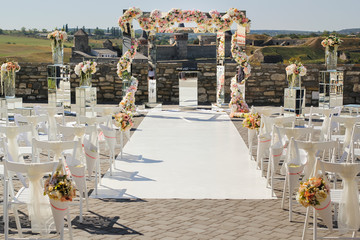 Wedding decoration of mirrors and flowers for the wedding ceremony