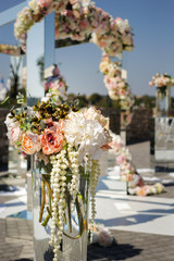 Wedding decoration with flowers at the wedding ceremony
