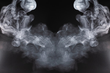 White steam on a black background.