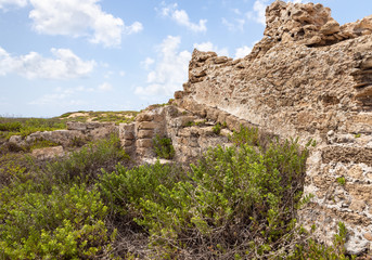 Fototapeta premium Remains of the old ruins of the - Turris Slinarum - Salt Tower fortress near to Jisr Ez Zarqa arab village. Located near the Atlit city in northern Israel