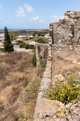 Fototapeta na wymiar Remains of old ruins of Kafarlet fortress. It was the property of Lords of Caesarea, then became the property of the Hospitallers. Captured by Baybars in 1291. Near the Atlit city in northern Israel