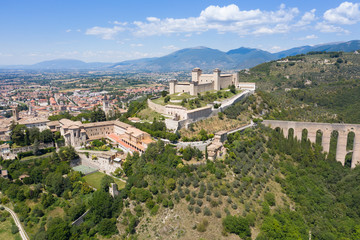 Fototapeta na wymiar aerial view of the city of spoleto with a view of the castle and the bridge of the towers umbria italy