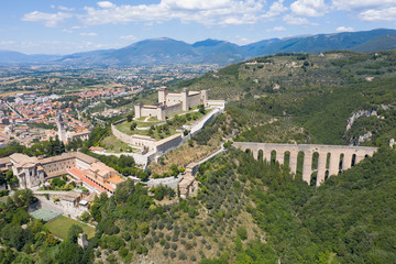 Fototapeta na wymiar aerial view of the city of spoleto with a view of the castle and the bridge of the towers umbria italy