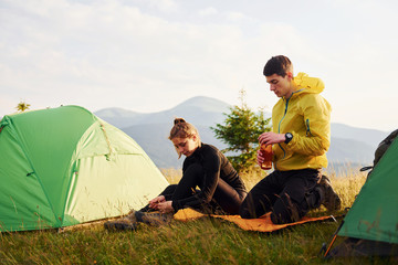 Enjoying hiking together. Majestic Carpathian Mountains. Beautiful landscape of untouched nature