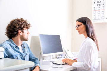 A female Doctor explaining a Diagnosis in the consultation room