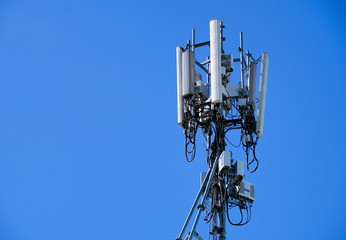 Telecommunication pole of 4G and 5G cellular. Base Station or Base Transceiver Station. 5G radio network telecommunication equipment with radio modules and smart antennas mounted on a metal.  