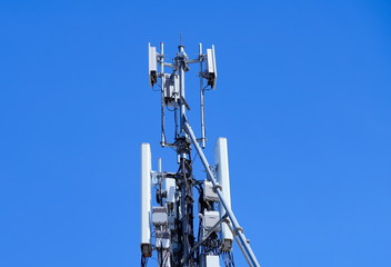 Telecommunication pole of 4G and 5G cellular. Base Station or Base Transceiver Station. 5G radio network telecommunication equipment with radio modules and smart antennas mounted on a metal.  
