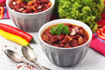 Two bowls with traditional Georgian dish - lobio	