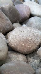 large round gray stones. the background. close-up