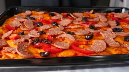 Large pan with homemade pizza.