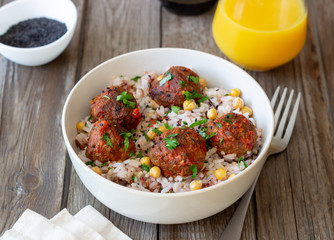 Meatballs with rice, chickpea and sesame seeds. Healthy eating. Diet. Oriental cuisine.