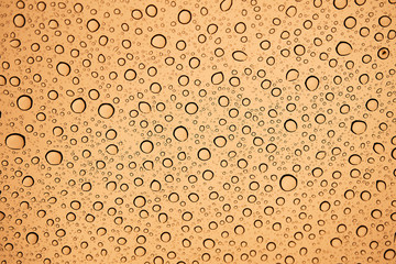 Raindrops background on glass close-up