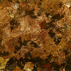 gold leaf on buddha statue texture