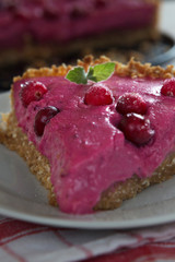 Cranberry tart with berries and mint