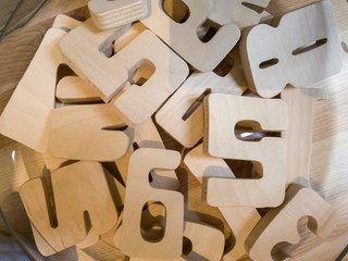 wooden figures, figures from plywood lie on the table