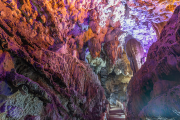 Fototapeta na wymiar Colorful natural stalactite landscape in the cave