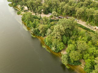 Aerial view. Green bank of the Dnieper river on a summer day.