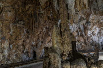 Close-up of beautiful gray stalactites in the cave