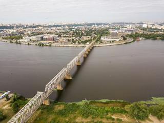 Fototapeta premium Aerial drone view. Railway bridge over the Dnieper river in Kiev.